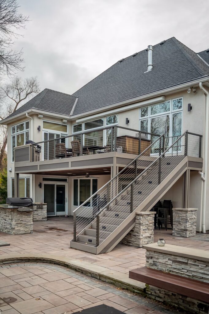 Angled view of a 2-tone custom deck with integrated grill above.