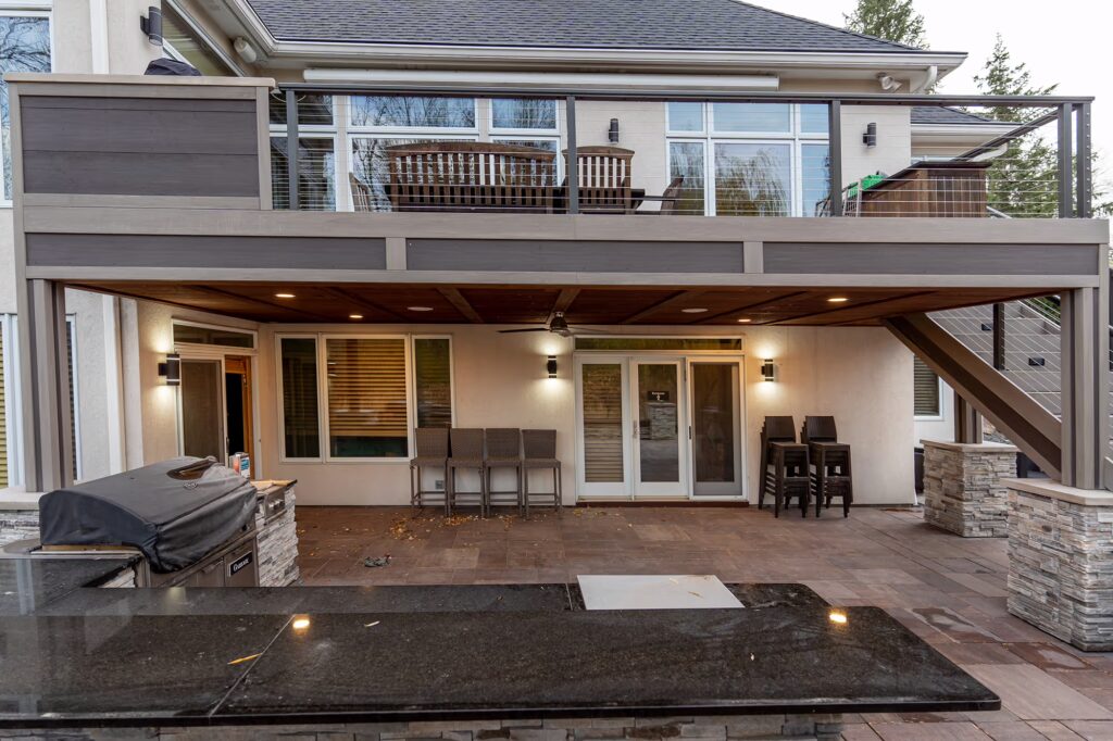 Front view of TimberTech Advanced PVC deck showcasing custom two-tone fascia.