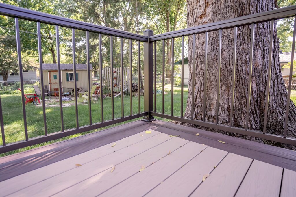 Corner of low-maintenance deck highlighting the contrasting border color.