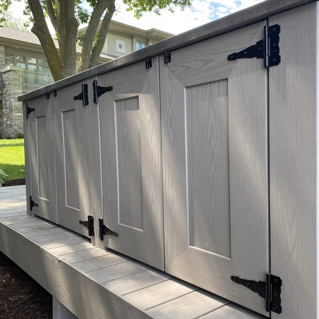 Built-in deck storage cabinets using TimberTech Advanced PVC in Slate Gray. 