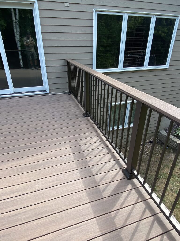 TimberTech Advanced PVC English Walnut in direct sunlight.