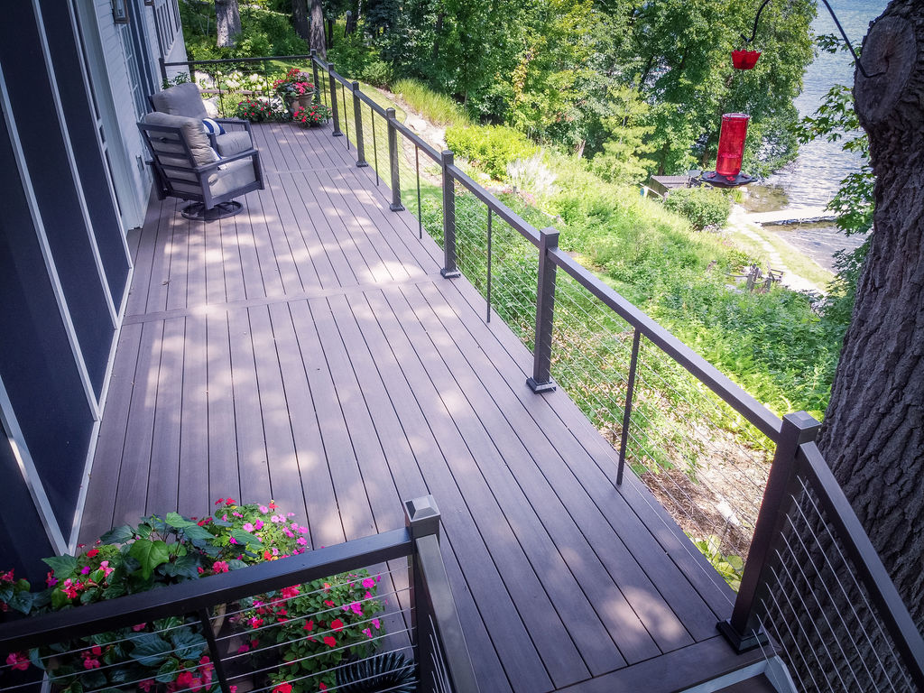 TimberTech Advanced PVC deck in American Walnut with cable railing.