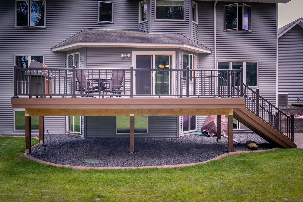 Front view of low-maintenance deck with TimberTech Advanced PVC fascia in the color Mahogany. 