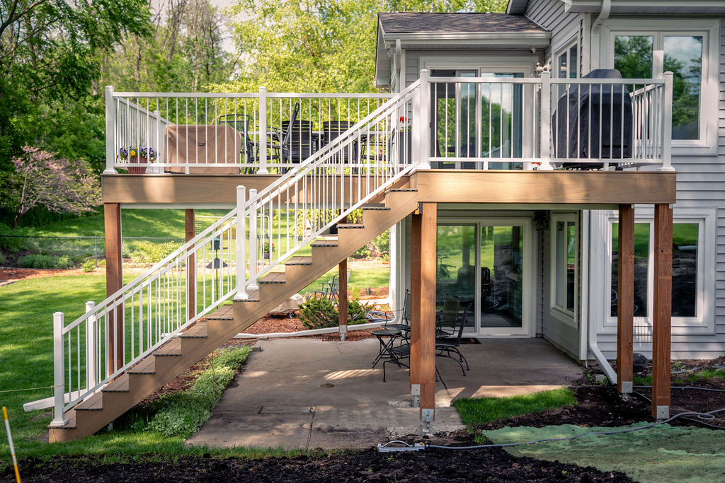 Side view of deck stairs with low-maintenance engineered materials. 