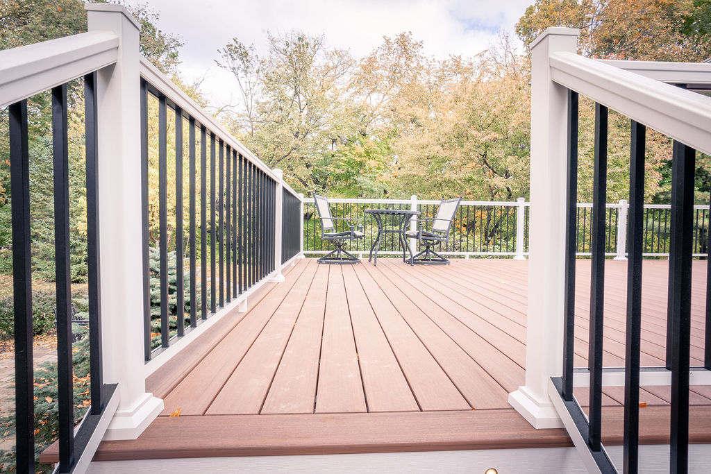 TimberTech deck in the color Mahogany with picture frame detail around the edges.