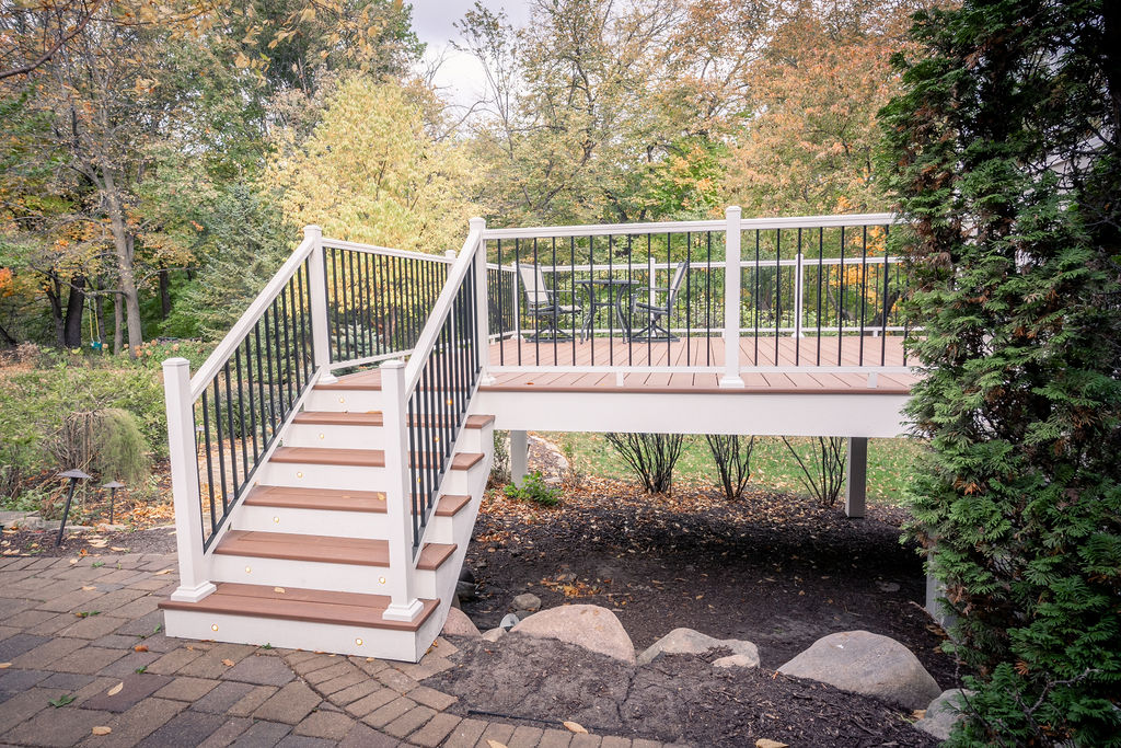 Wide view of PVC deck and stairs from the front of the house.