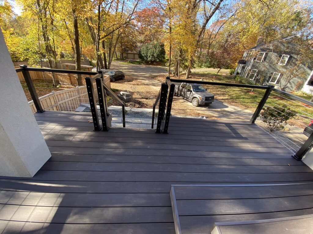 View of deck and front lawn from front door.