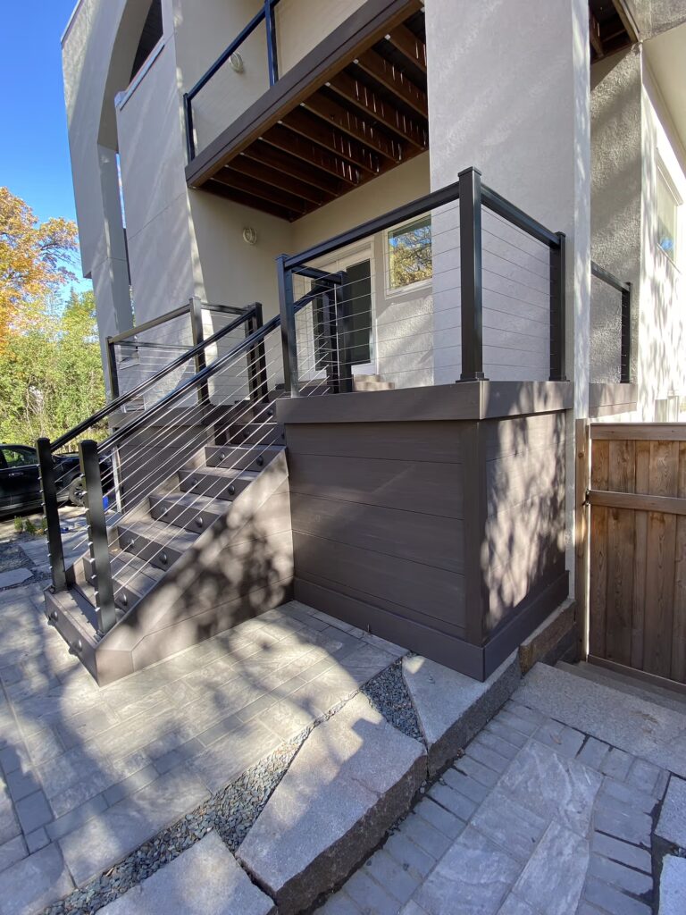Porch deck built with TimberTech Advanced PVC and cable railing.
