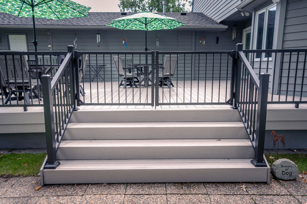 Extra-wide 8-foot deck stairs with custom double-width stair gate.