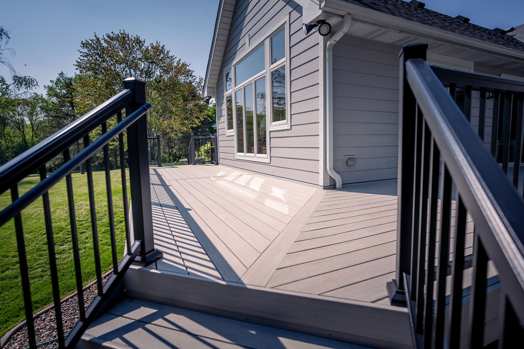 Diagonal chevron deck board layout with splitter board using TimberTech Advanced PVC.